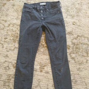 9" Highrise skinny in a dark grey wash